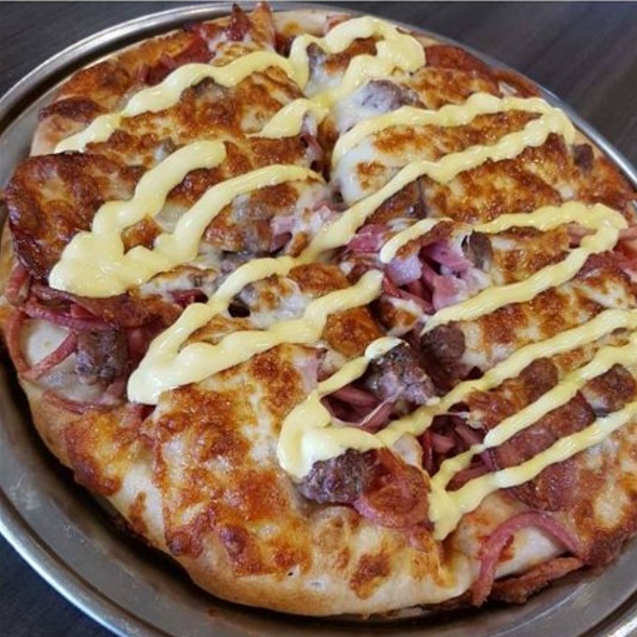Ajays Pizzeria.