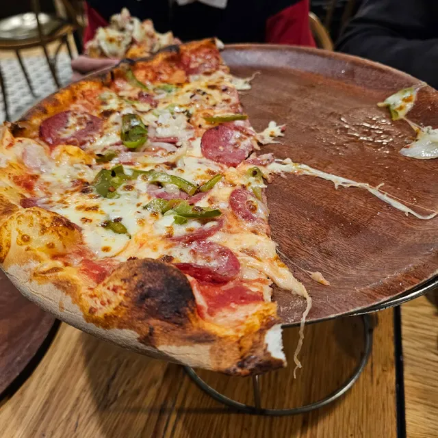 Mancini's Original Woodfired Pizza