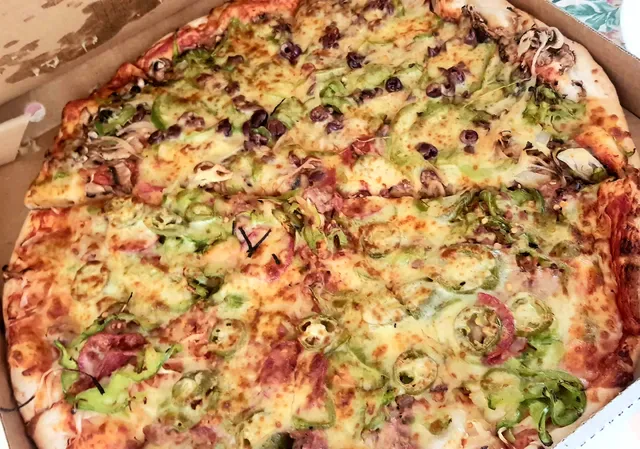 Ajays Pizzeria.
