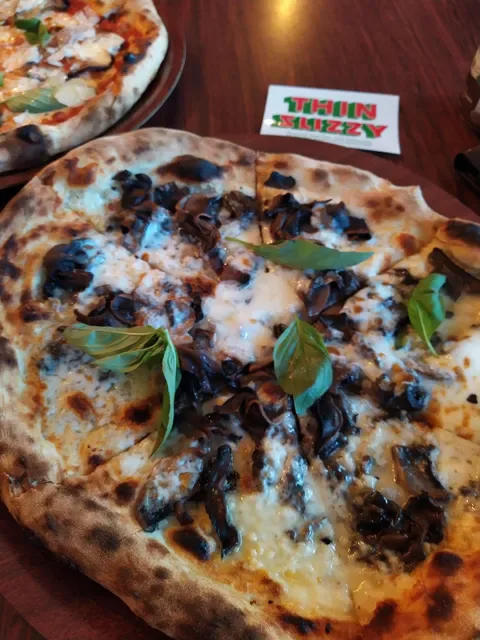 THIN SLIZZY PIZZERIA